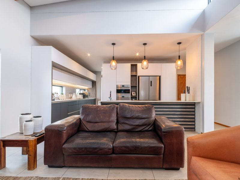 Modern 4 Bedroom Home with Solar & Heated Pool in Secure Swallow Hills Estate - Photo 9