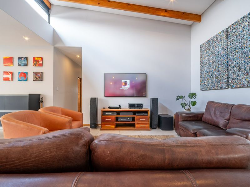 Modern 4 Bedroom Home with Solar & Heated Pool in Secure Swallow Hills Estate - Photo 8