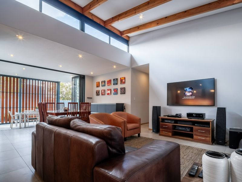 Modern 4 Bedroom Home with Solar & Heated Pool in Secure Swallow Hills Estate - Photo 7