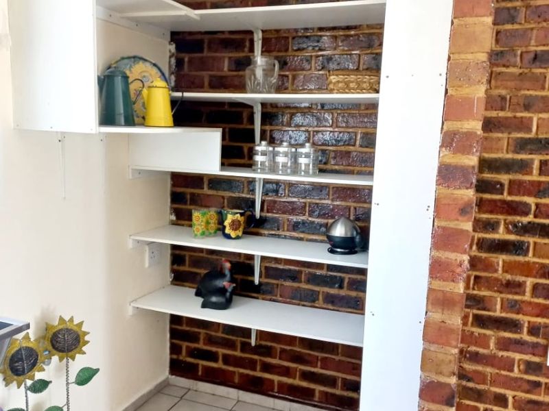 Bachelor Unit to Rent on Plot  Looking for a peaceful, secure space of your own? This charming bachelor unit is the perfect fit for a single person seeking comfort and privacy.  Features: 	•	Open-plan bachelor unit 	•	Situated on a quiet plot 	•	Very safe and secure environment 	•	Lock-up garage included for your convenience 	•	Ideal for one person Gas geyser and gas stove  Please note: No pets allowed  Enjoy a calm lifestyle with added security and your own private space — perfect for someone who values simplicity and safety. - Photo 3