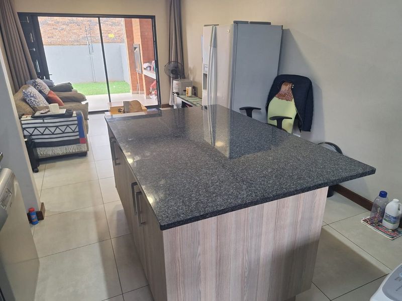 Modern Living in a Secure Estate — Stylish 2-Bedroom Home - Photo 5