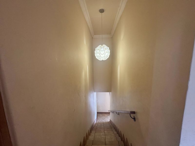 This charming 3-bedroom, 2.5-bathroom townhouse is situated in a secure estate, offering both comfort and privacy. - Photo 8