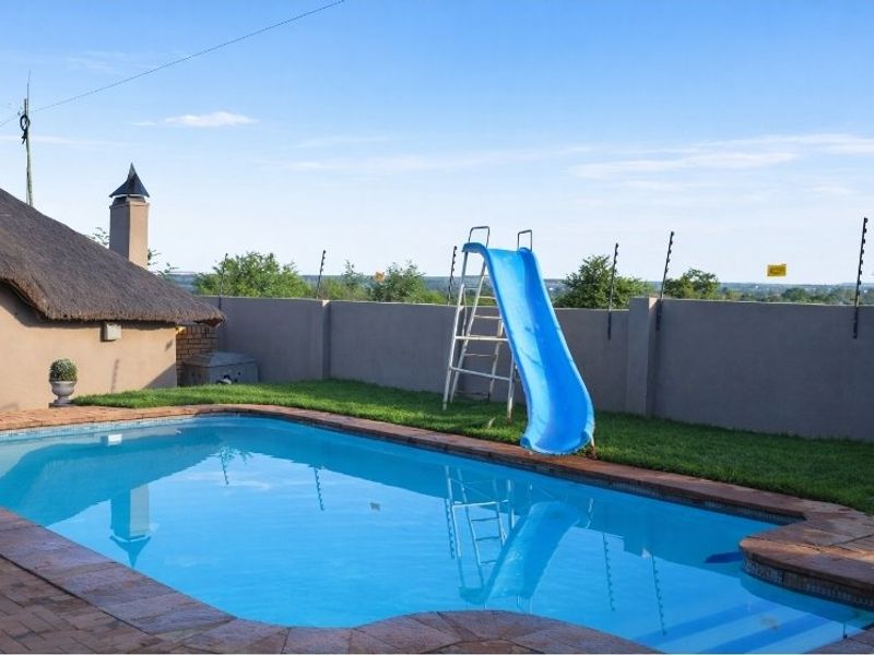 AN EXTRAORDINARY FOUR-BEDROOM RESIDENCE IN PRIME DORINGKRUIN – WHERE SPACE, SECURITY & VERSATILITY UNITE - Photo 3