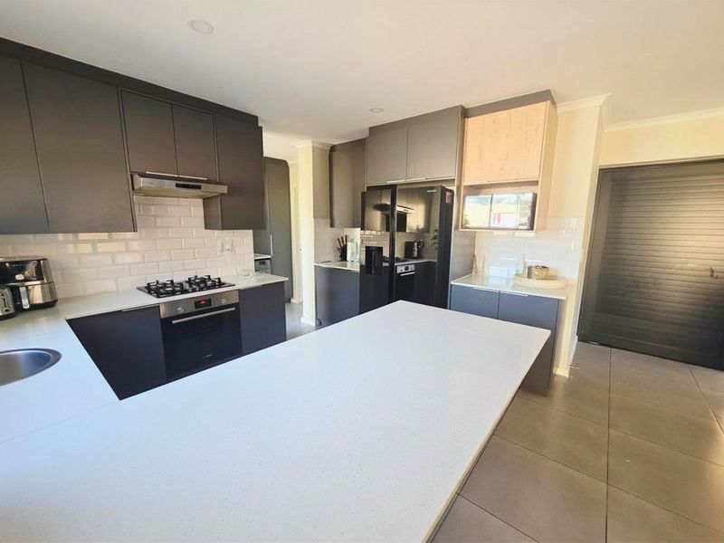 That rare five-bedroom find in the heart of Sandown | Bold on the outside. Exceptional on the inside - Sole Mandate - Photo 2