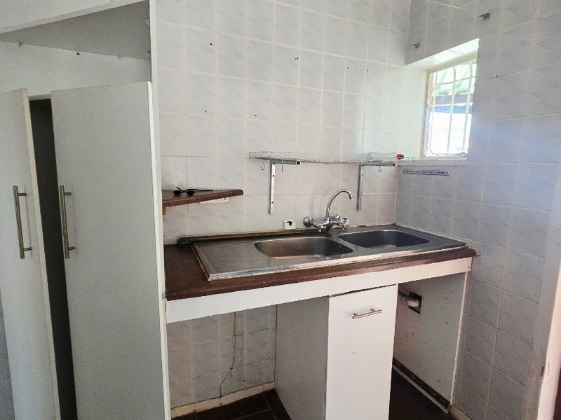 Charming Family Home with Flatlet and Pool in Stilfontein Ext 4 - Photo 9