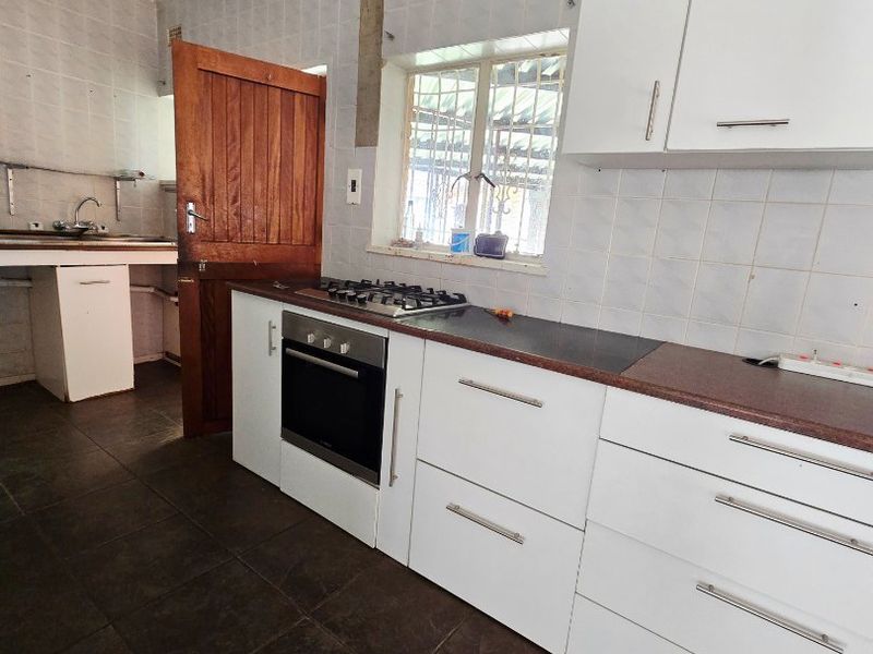 Charming Family Home with Flatlet and Pool in Stilfontein Ext 4 - Photo 8