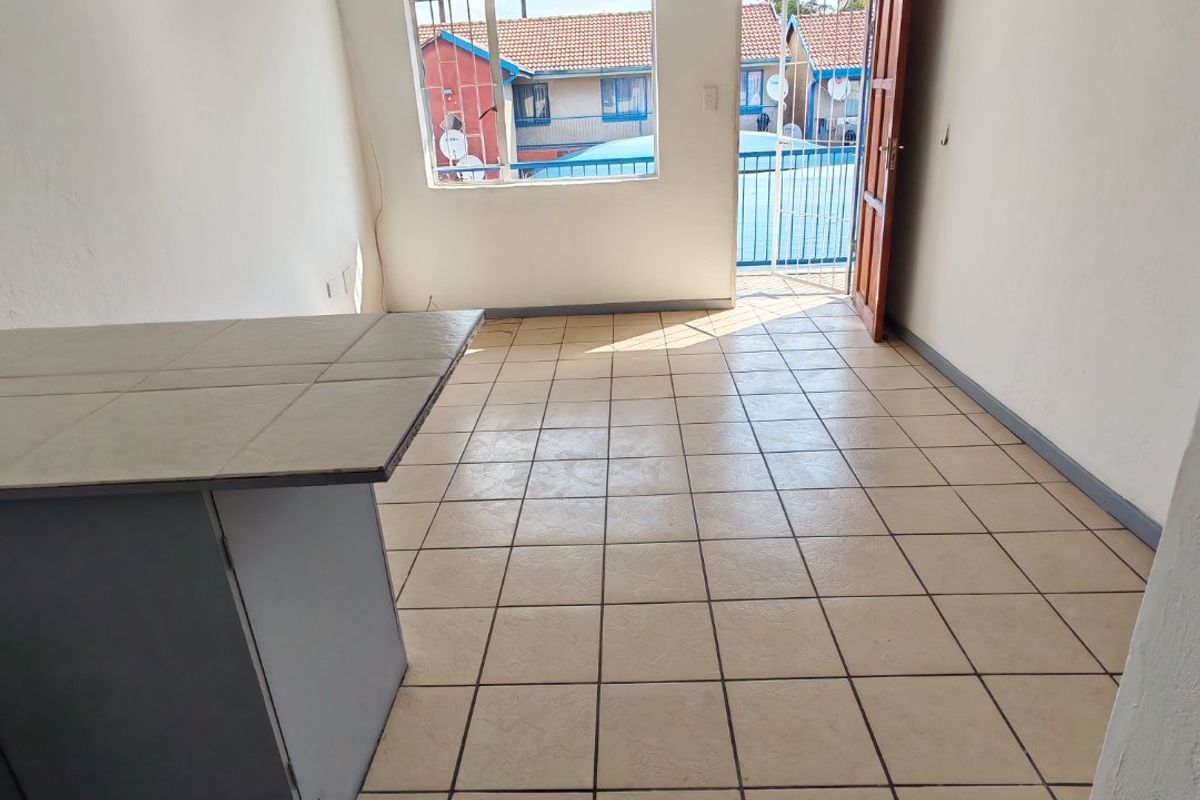 Charming & Well-Maintained 2-Bedroom Apartment in the Heart of Ladanna - Photo 4