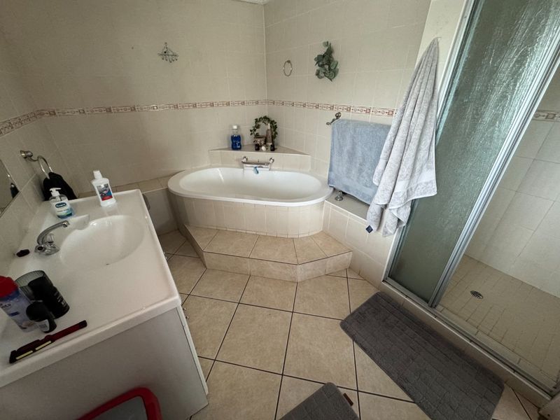 Expansive 5-Bedroom Home with Study and Multiple Living Areas - Photo 10