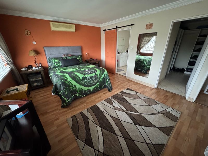 Expansive 5-Bedroom Home with Study and Multiple Living Areas - Photo 9