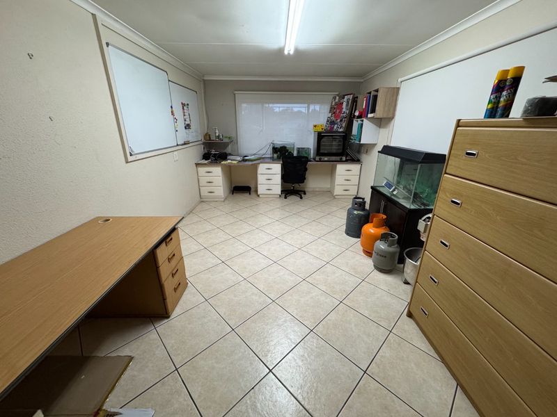 Expansive 5-Bedroom Home with Study and Multiple Living Areas - Photo 8