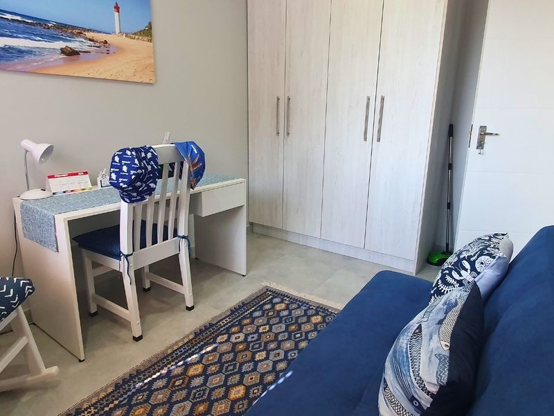 Low-Maintenance Coastal Living in Pet-Friendly Eco Estate - Photo 9