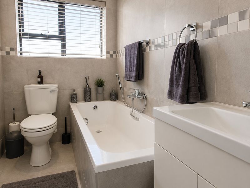 Low-Maintenance Coastal Living in Pet-Friendly Eco Estate - Photo 10