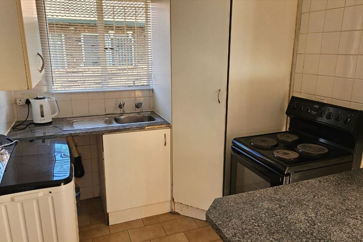 Cozy Two-Bedroom Home with Practical Features - Photo 2