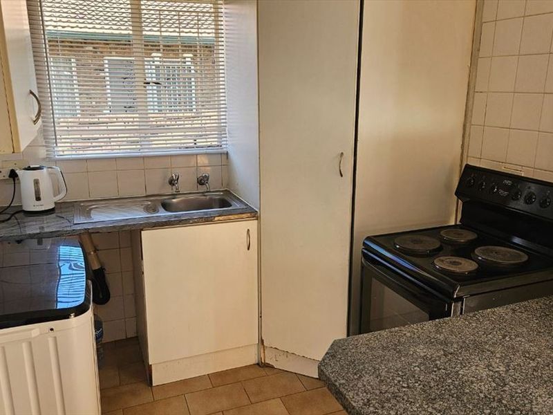 Cozy Two-Bedroom Home with Practical Features - Photo 2