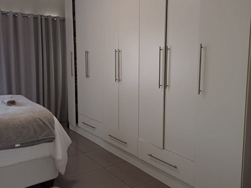 Discover modern living at its finest with this beautiful, move-in-ready home designed for comfort and style. - Photo 10