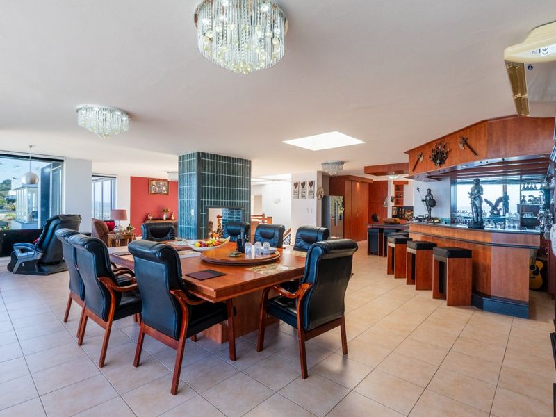 ELEVATED 7 BEDROOM COASTAL MASTERPIECE WITH INCOME POTENTIAL & UNINTERRUPTED OCEAN VIEWS - Photo 6