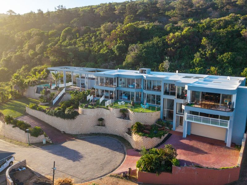 ELEVATED 7 BEDROOM COASTAL MASTERPIECE WITH INCOME POTENTIAL & UNINTERRUPTED OCEAN VIEWS - Photo 4