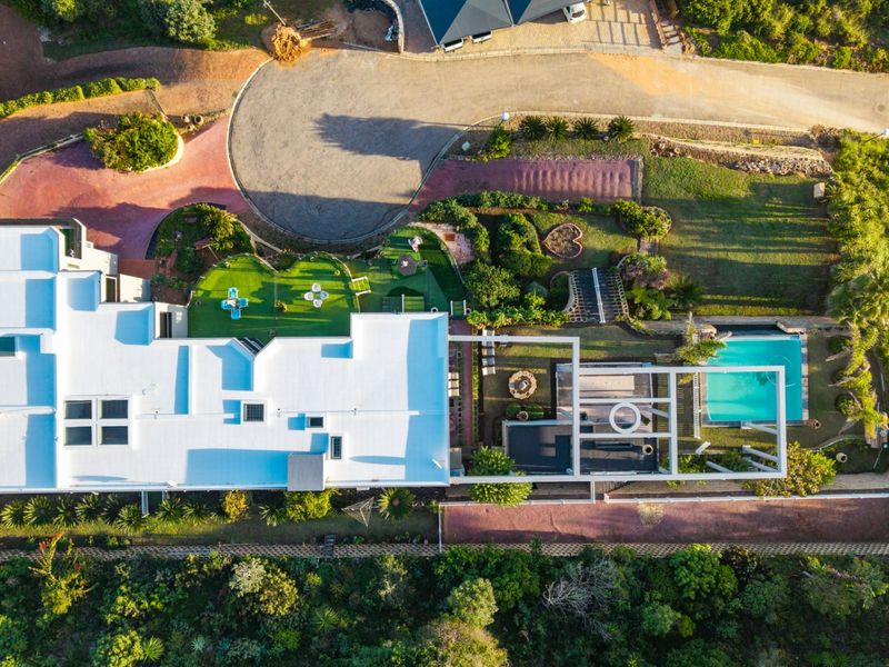 ELEVATED 7 BEDROOM COASTAL MASTERPIECE WITH INCOME POTENTIAL & UNINTERRUPTED OCEAN VIEWS - Photo 3