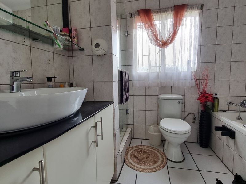 Secure Family Home with Pool in Convenient Location - Photo 7