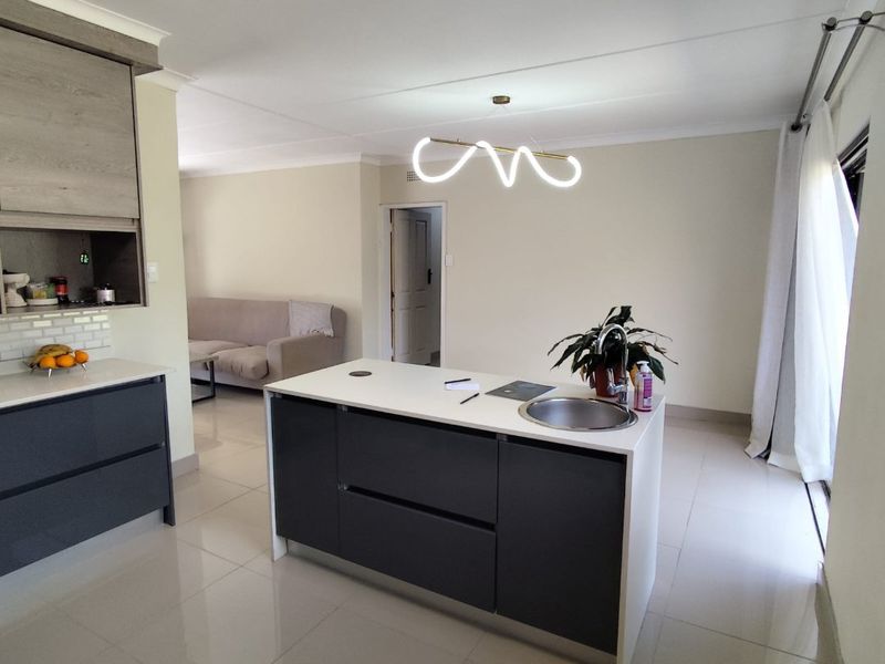 Ultra-Modern Elegance Meets Spacious Family Living! - Photo 10