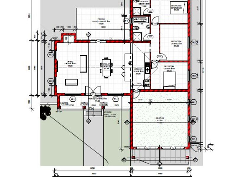 A detailed architectural floor plan showing the layout of the house, including living areas, kitchen, bedrooms, bathrooms, and garage.