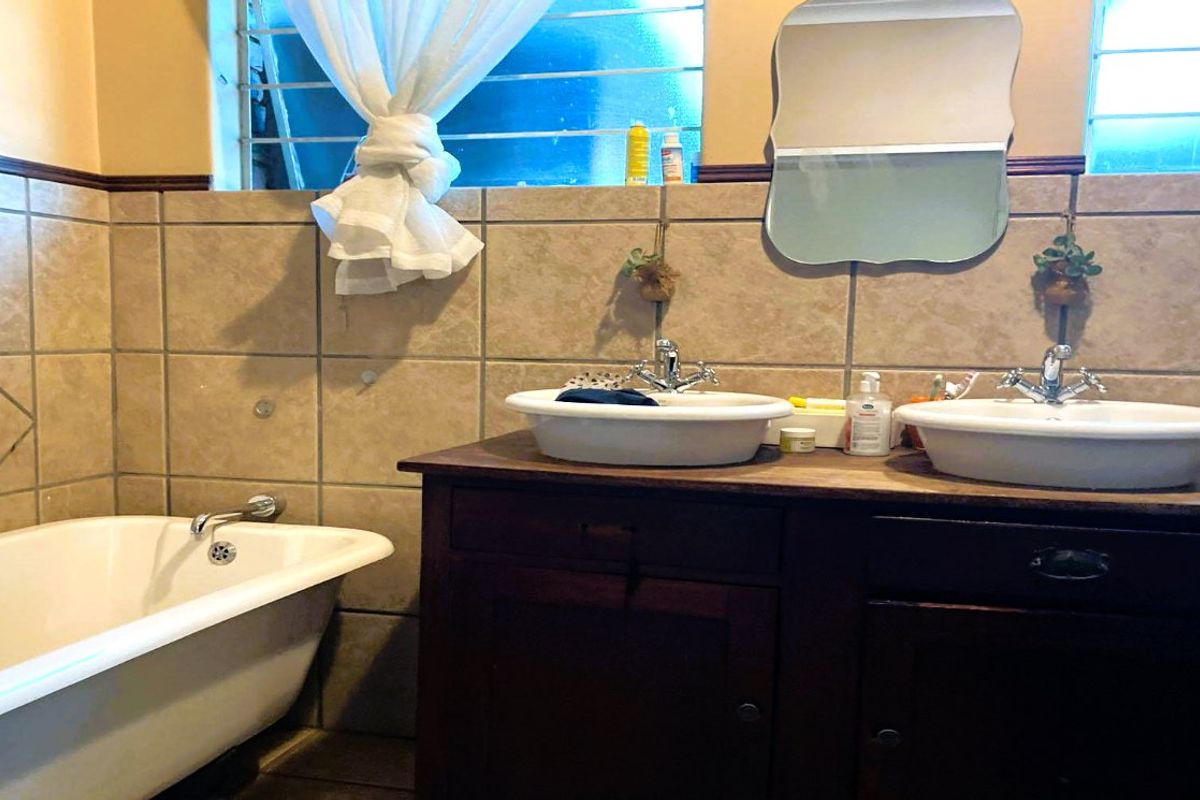 Discover exceptional family living in the heart of Lyttelton Manor, one of Centurion’s most established and sought-after suburbs. This spacious 4-bedroom home offers the perfect balance of comfort, functionality, and timeless charm—ideal for growing families or buyers looking for extra space to work and entertain. - Photo 5