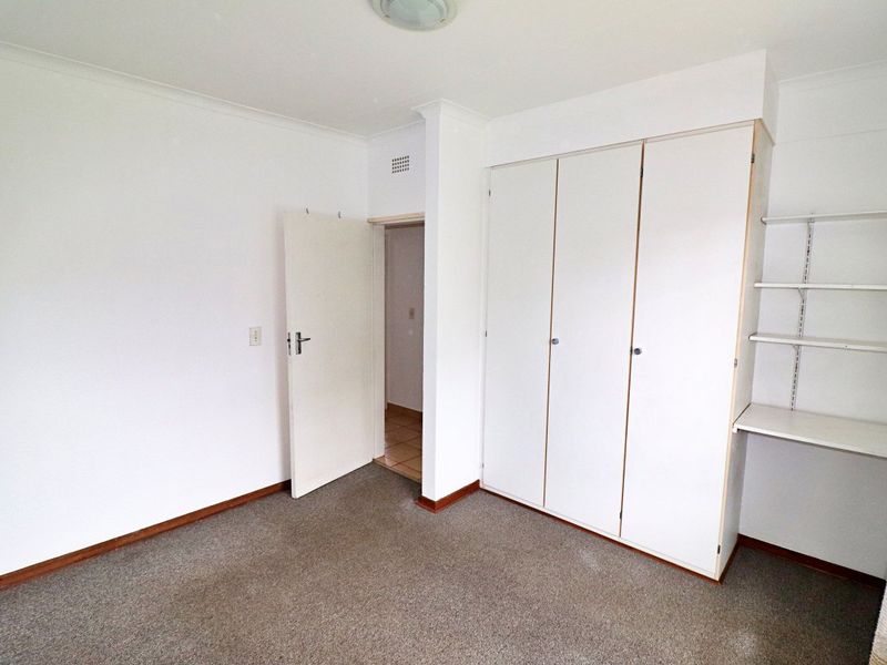 Charming 2-Bedroom Simplex with Beautiful Garden Retreat - Photo 5