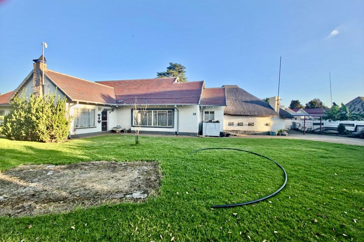 Stylish Stilfontein Home with Braai Room and Fibre - Photo 3