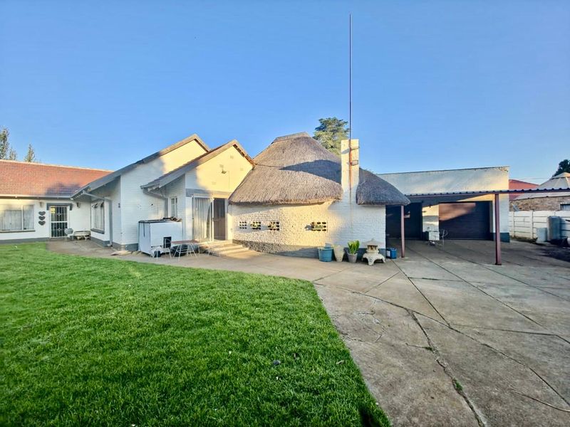 Stylish Stilfontein Home with Braai Room and Fibre - Photo 1