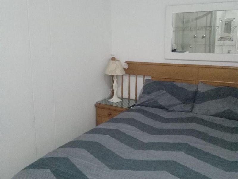 Coastal Flat with Sea Views and Veranda Vibe - Photo 9