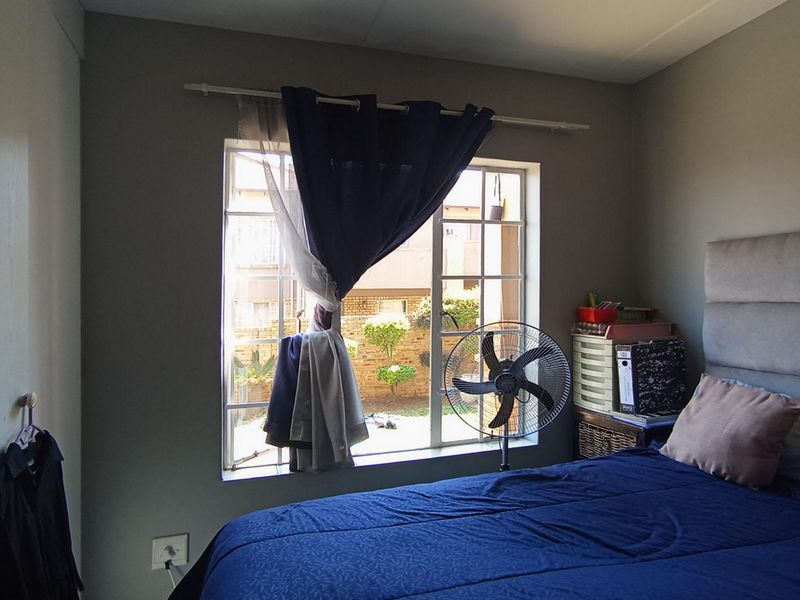 Modern Ground Floor Living with Private Garden & Built-In Braai in Carlswald View! - Photo 5