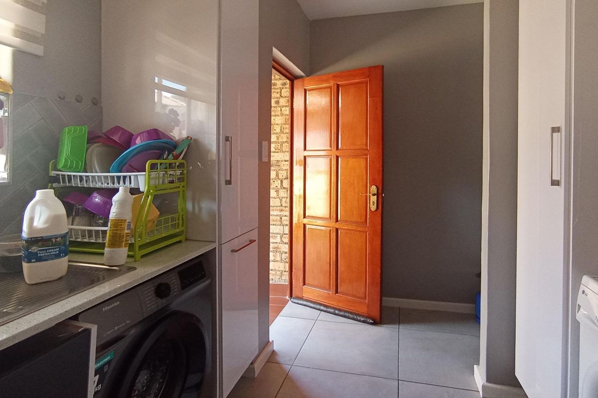 Modern Ground Floor Living with Private Garden & Built-In Braai in Carlswald View! - Photo 2