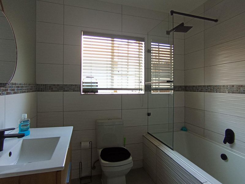 Modern Ground Floor Living with Private Garden & Built-In Braai in Carlswald View! - Photo 9