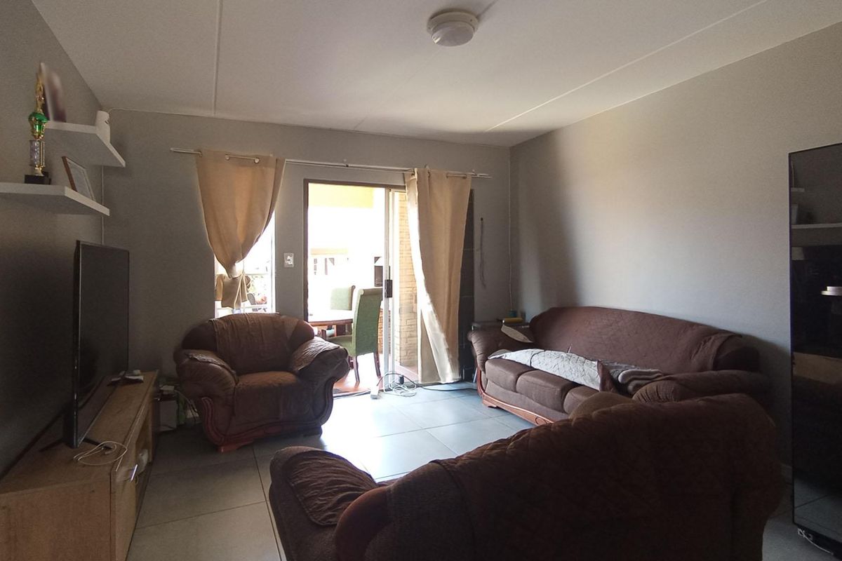 Modern Ground Floor Living with Private Garden & Built-In Braai in Carlswald View! - Photo 3