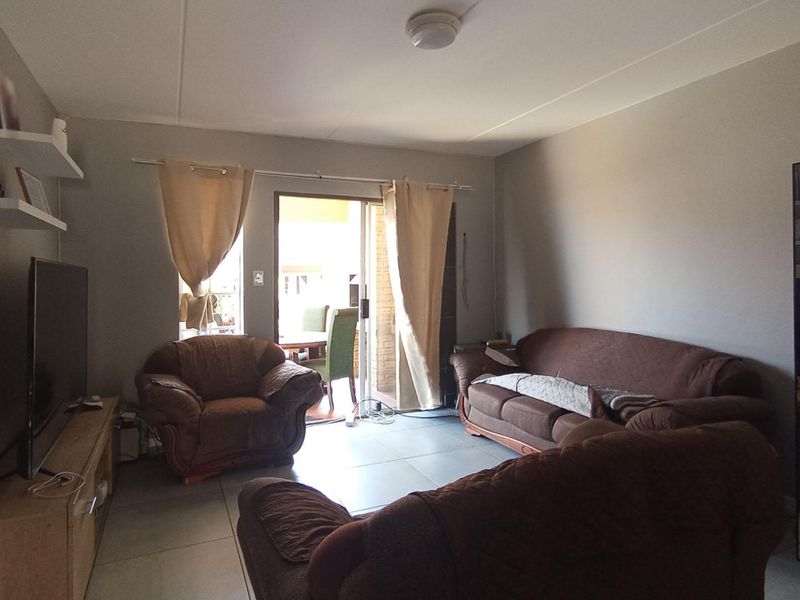 Modern Ground Floor Living with Private Garden & Built-In Braai in Carlswald View! - Photo 3