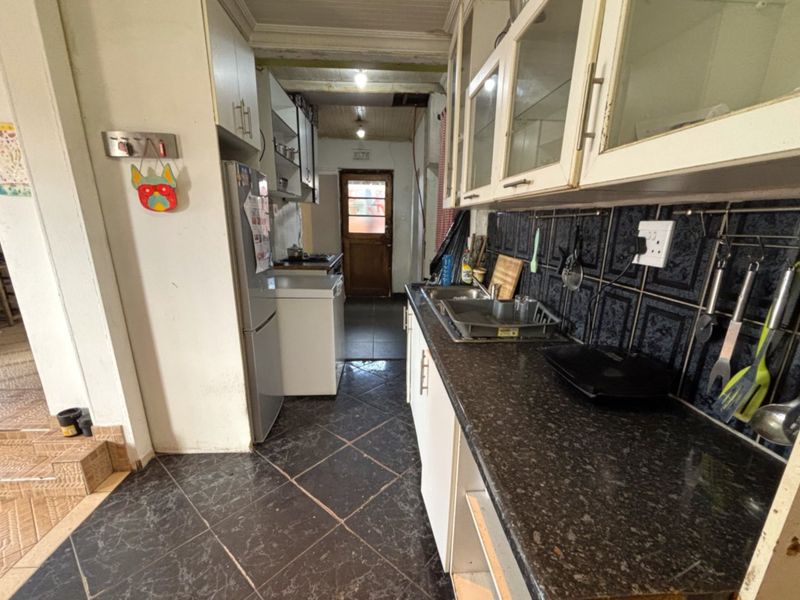 Corner 3-Bedroom Home with Separate Entrance - Photo 10