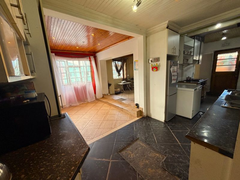 Corner 3-Bedroom Home with Separate Entrance - Photo 9