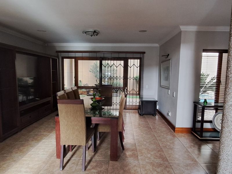 Set in the heart of Bedfordview, this elegant and spacious cluster home offers refined living in a highly sought-after location. - Photo 2