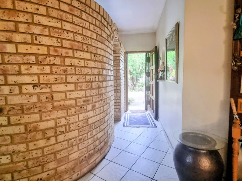 Spacious Four-Bedroom Home with Pool in Safe Area - Photo 8