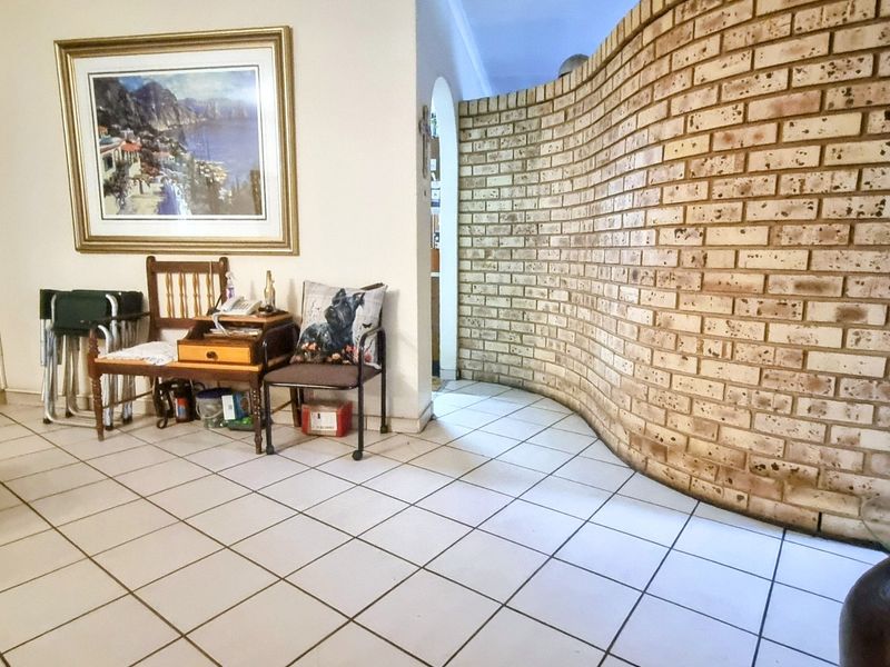 Spacious Four-Bedroom Home with Pool in Safe Area - Photo 9