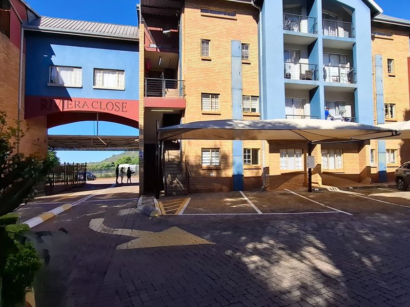 Riviera Pretoria Flat with Stylish Open Plan Living - Photo 1