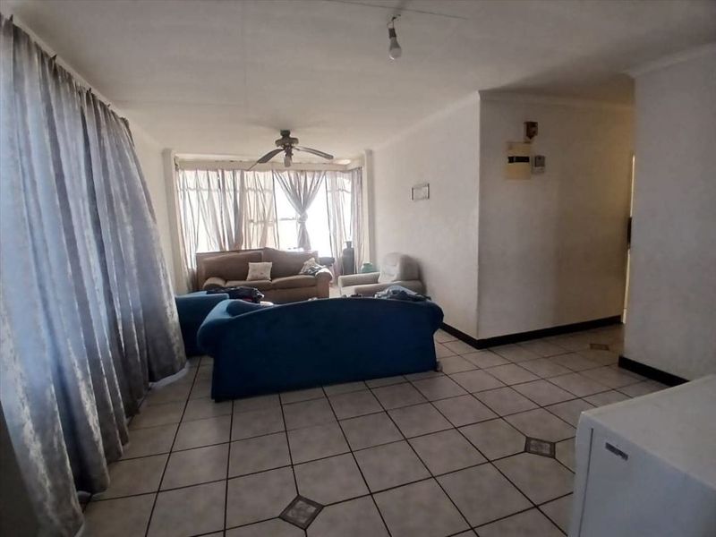 Cozy Two-Bedroom Home with Practical Living Spaces - Photo 2