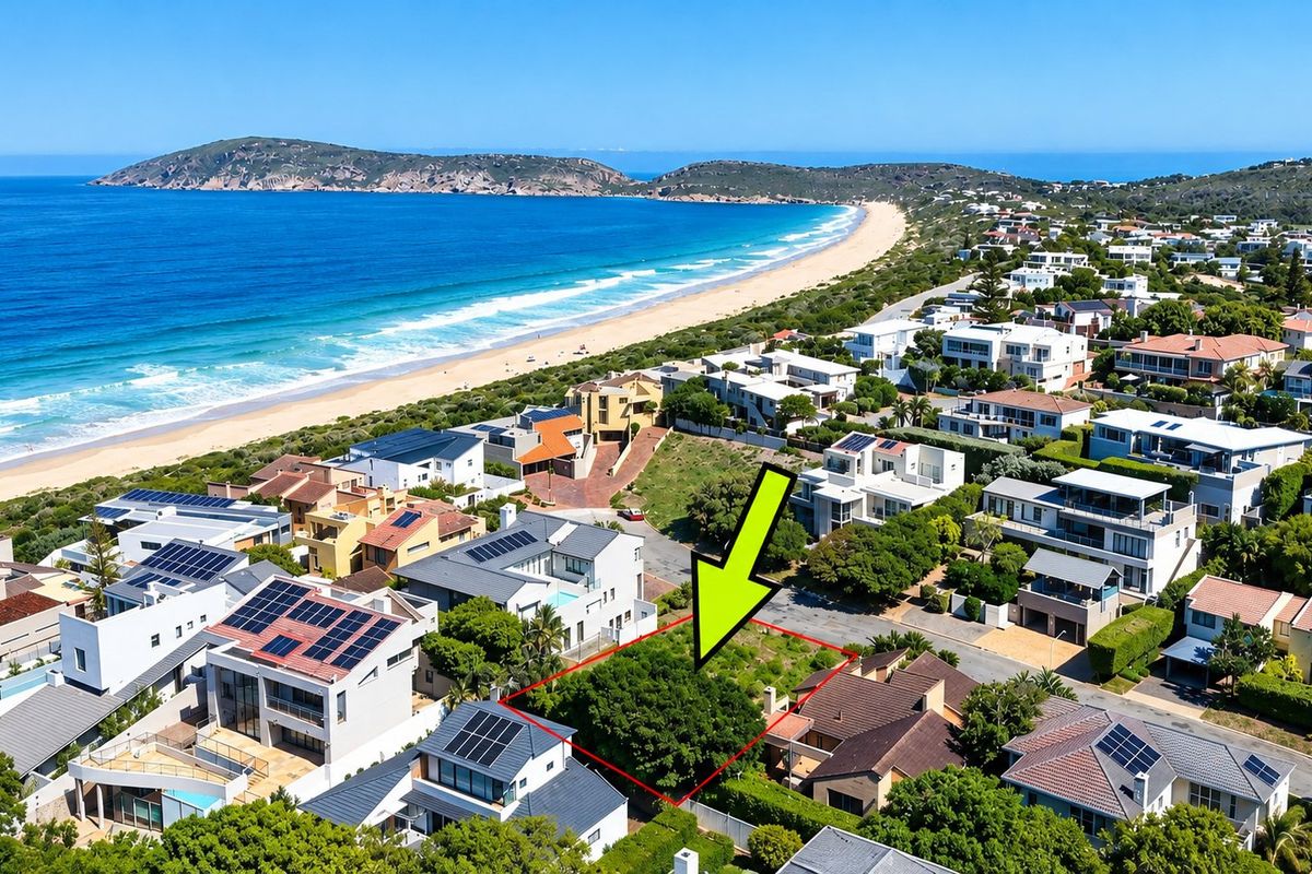 Aerial view of a vacant residential plot situated in a prime coastal neighborhood with direct proximity to the beach.