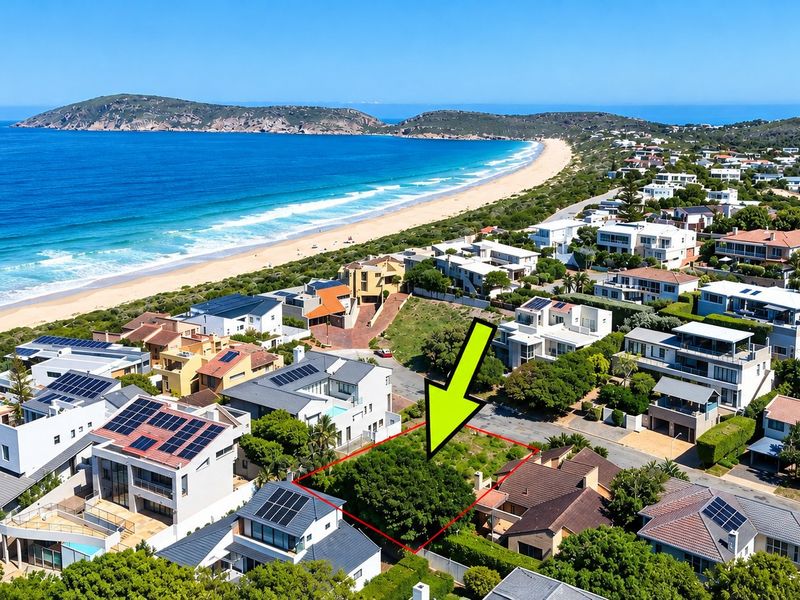 Aerial view of a vacant residential plot situated in a prime coastal neighborhood with direct proximity to the beach.