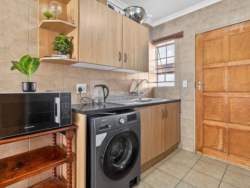 Family-Friendly Comfort in a Secure Estate - Photo 9