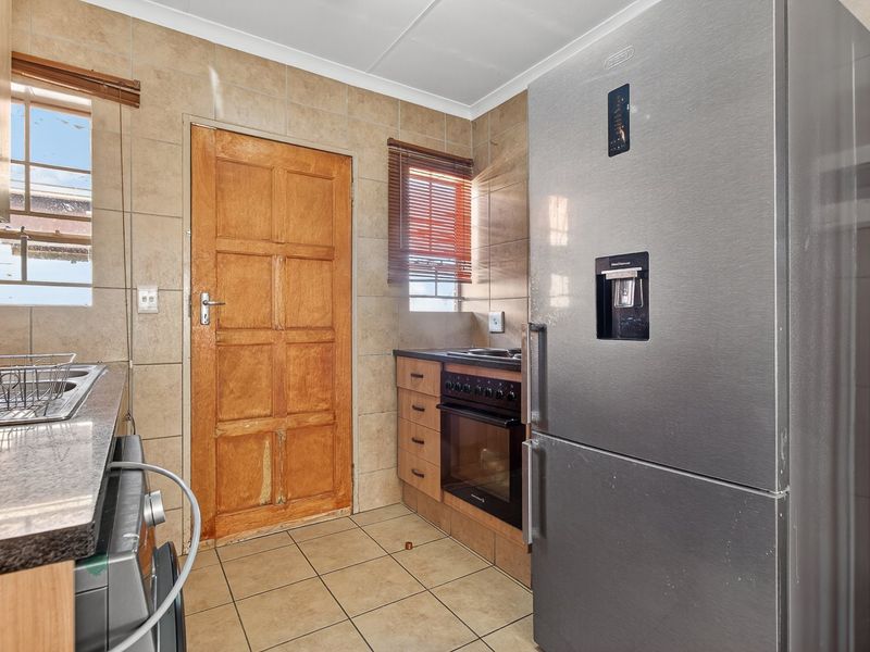 Family-Friendly Comfort in a Secure Estate - Photo 7