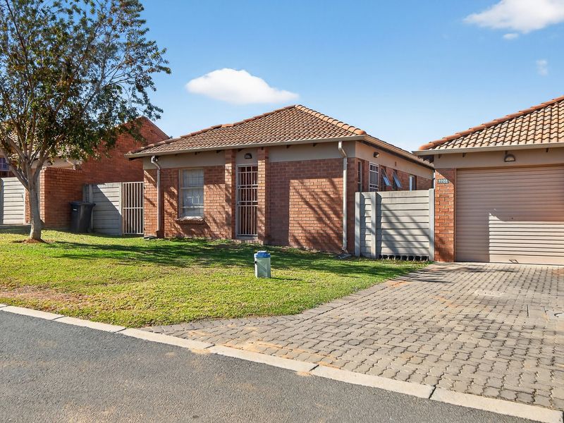 Family-Friendly Comfort in a Secure Estate - Photo 1