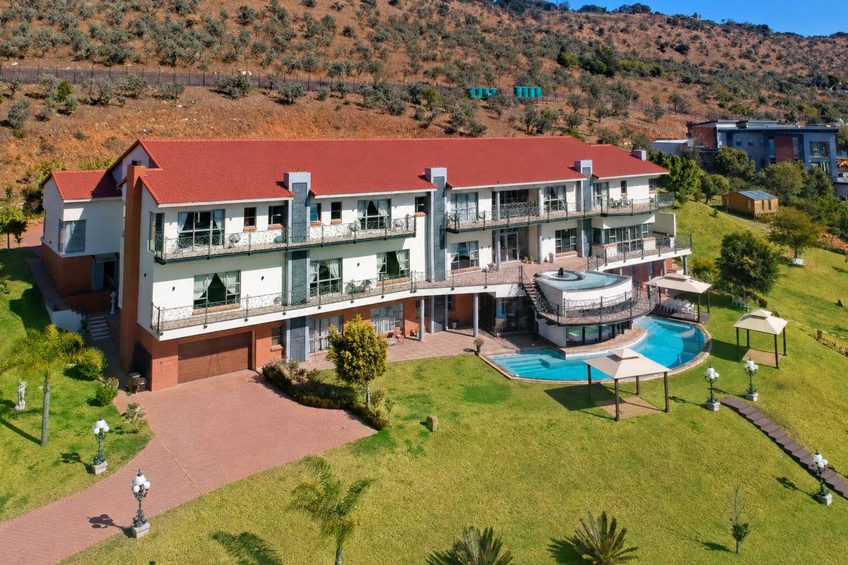 Hilltop Masterpiece with Panoramic Views & Development Potential | Poortview - Photo 3