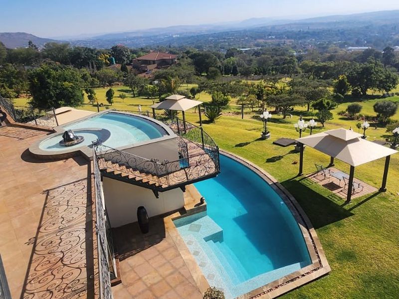 Hilltop Masterpiece with Panoramic Views & Development Potential | Poortview - Photo 2
