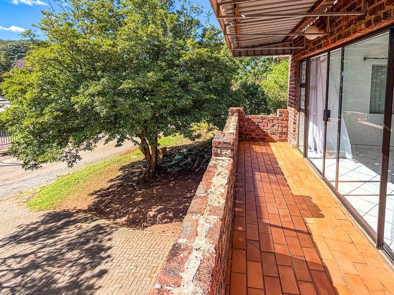 Older Charm Meets Modern Dreams in Spacious Gonubie Home with Valley Views and Room to Grow - Photo 9